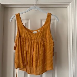 Good Luck Gem crop top with side tie details.